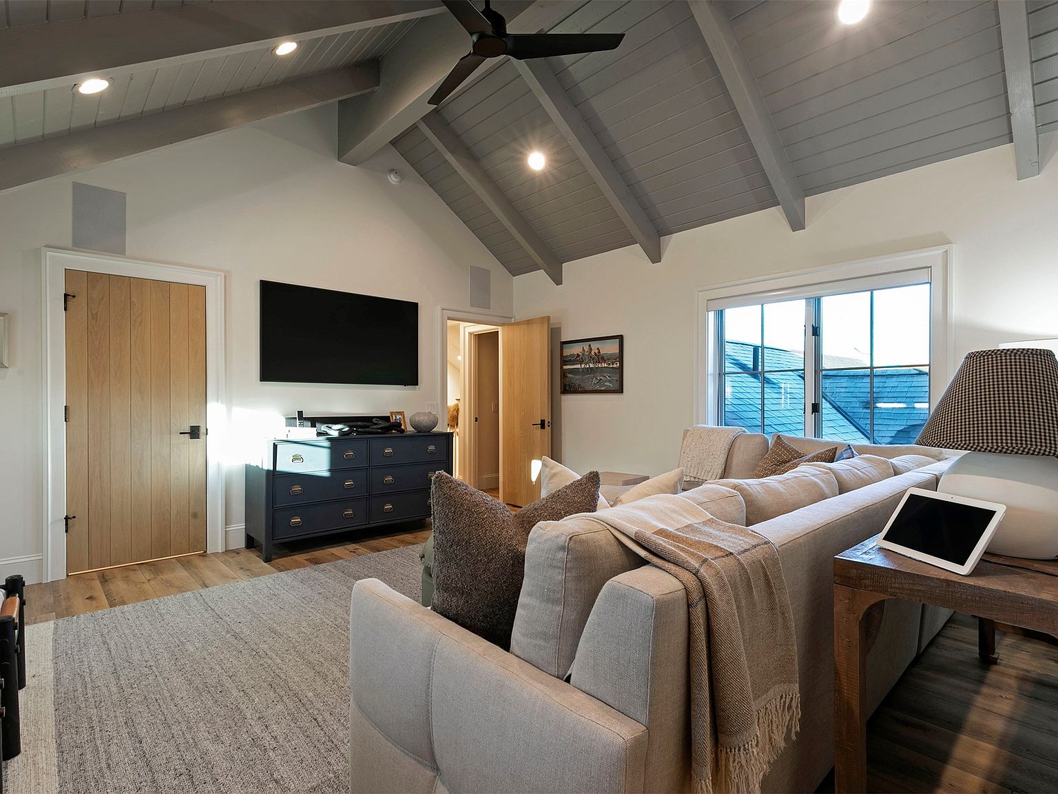 Theater-style media setup in a shared living space of a Bitterroot Valley smart home
